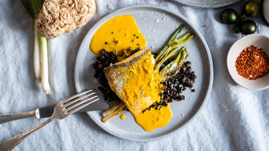 Zander auf Linsengemüse mit Safransud