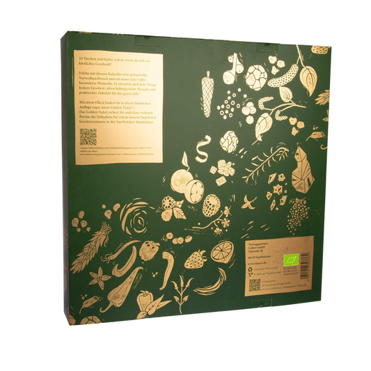 Grüne Box mit goldenen Illustrationen von Gemüse, Früchten und Kräutern.