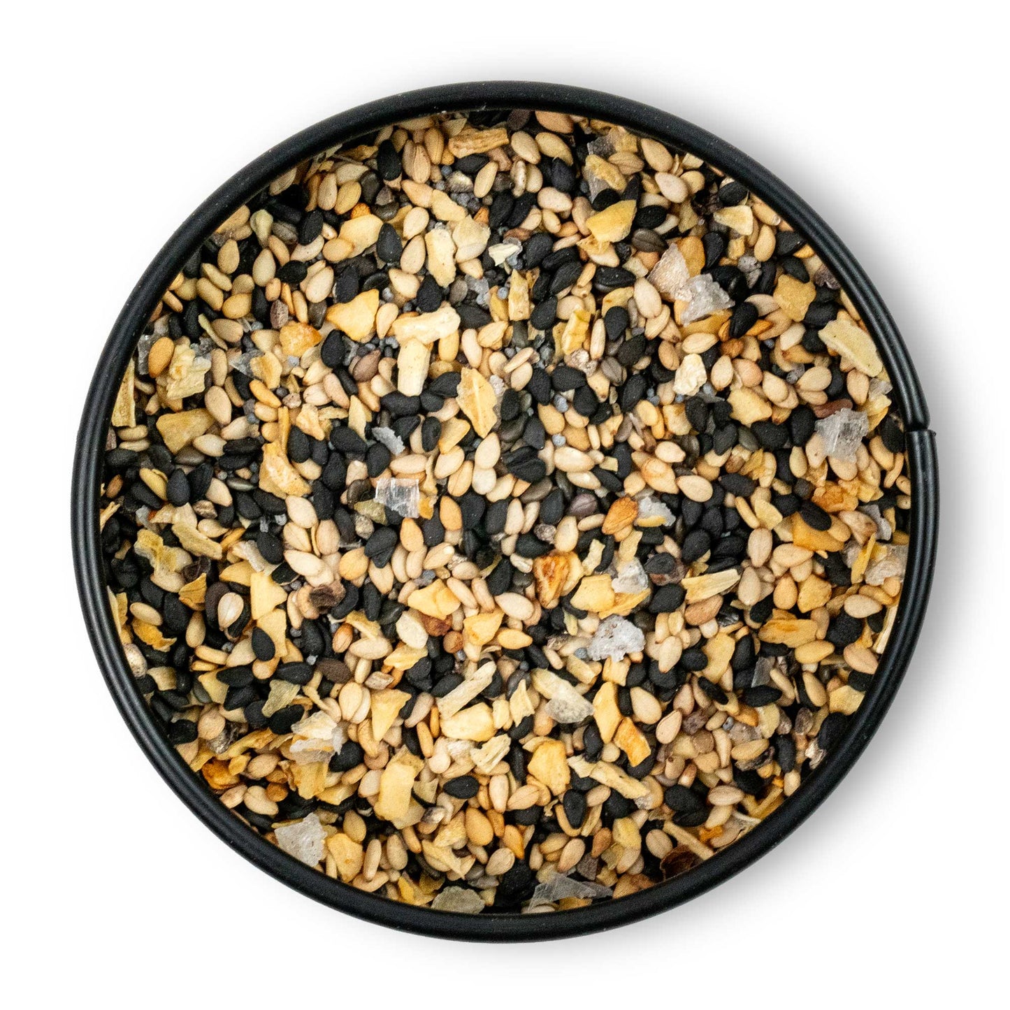 Runde Schale mit grobem Annes Bagel Spice: Sesam, Mohn, getrockneter Knoblauch und Salz von oben.