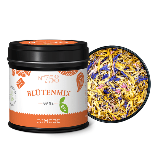 Geöffnete Dose mit bunten, essbaren Blütenblättern neben Dose mit Aufschrift Bio Blütenmix.