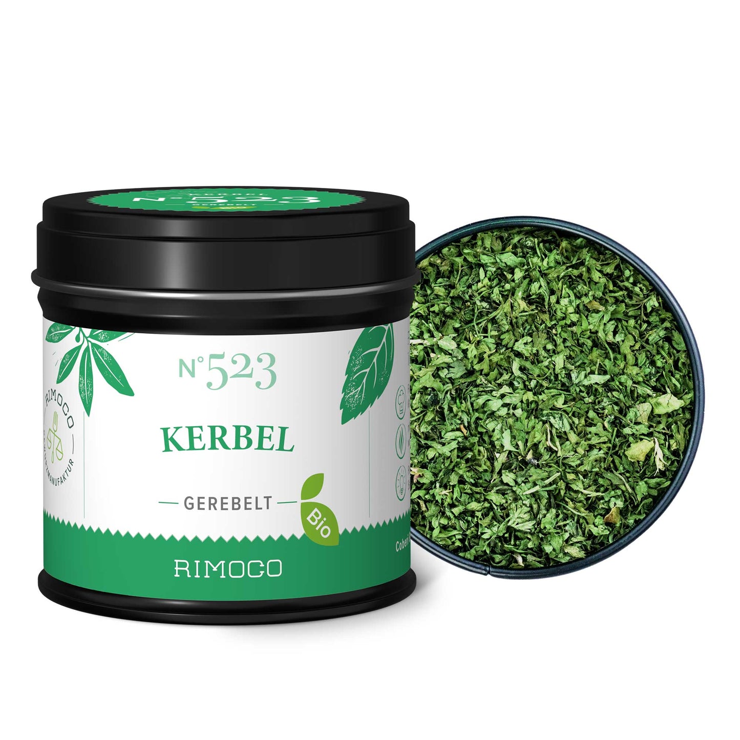 Schwarze Dose Bio Kerbel, daneben gehackte, getrocknete Kräuter und etwas Kraut verstreut.