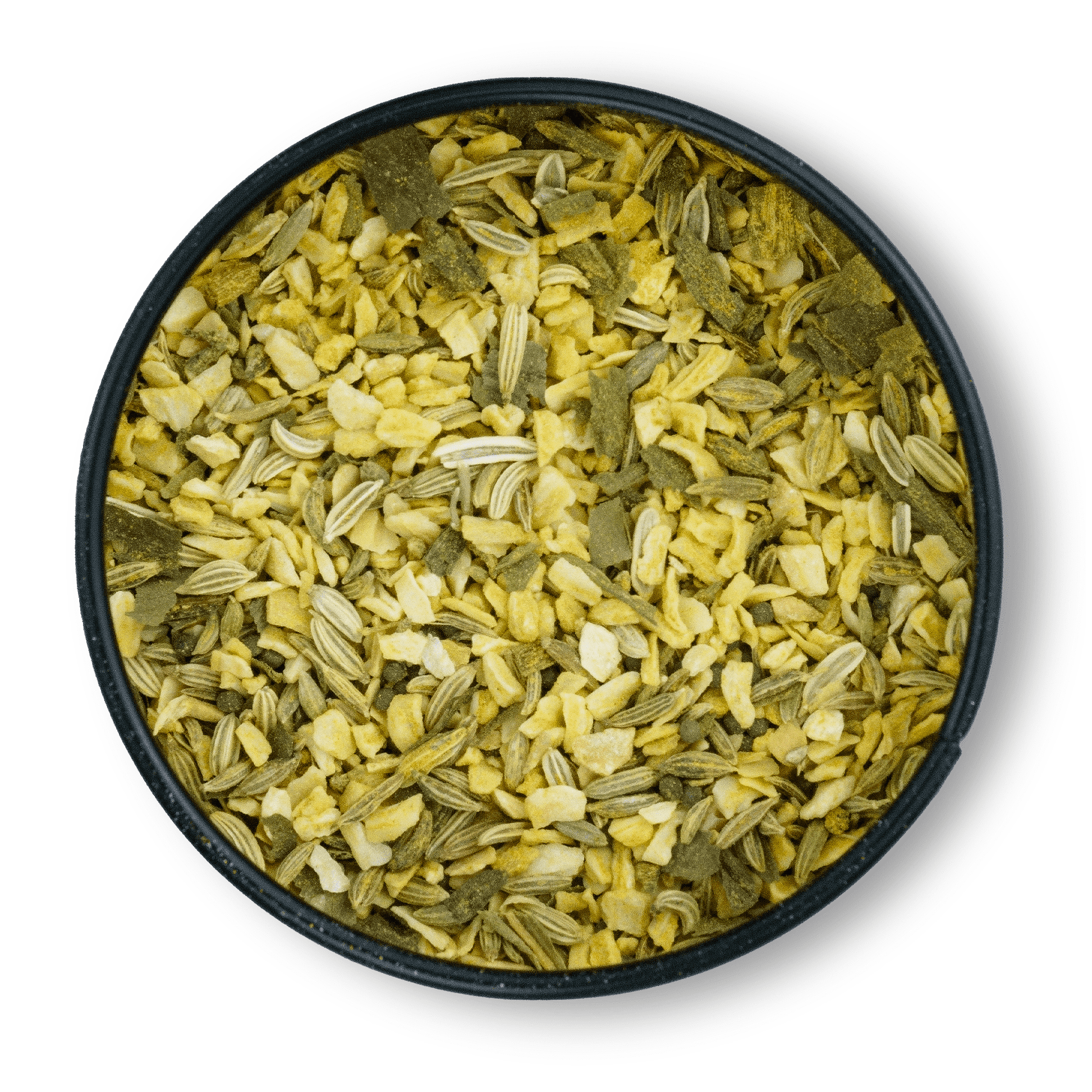 Runde Dose mit Bio Manuvan Gewürz; gut sichtbare Körner von Knoblauch und Fenchelsamen.